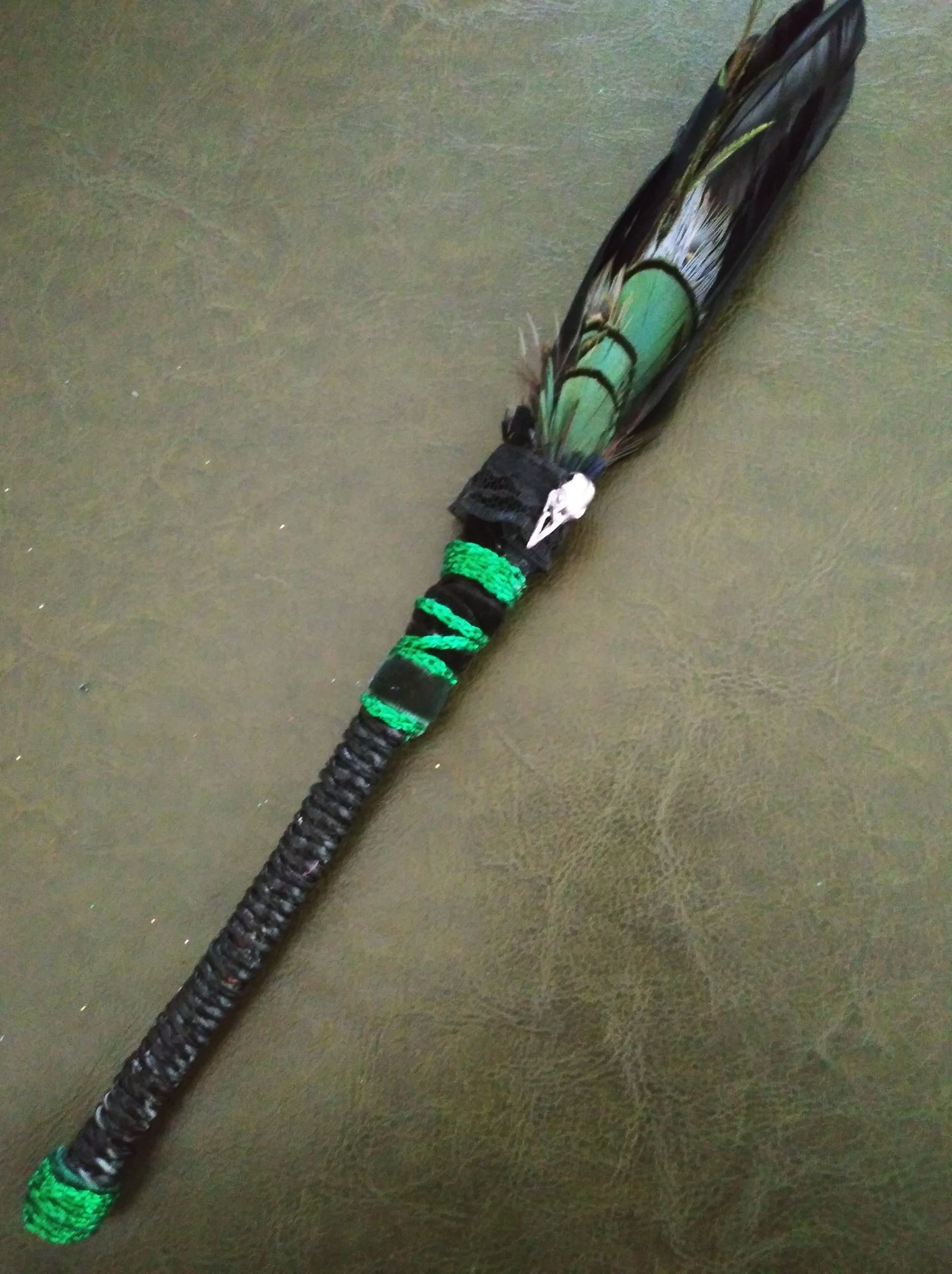 Green and Black smudge fan w/raven skull charm