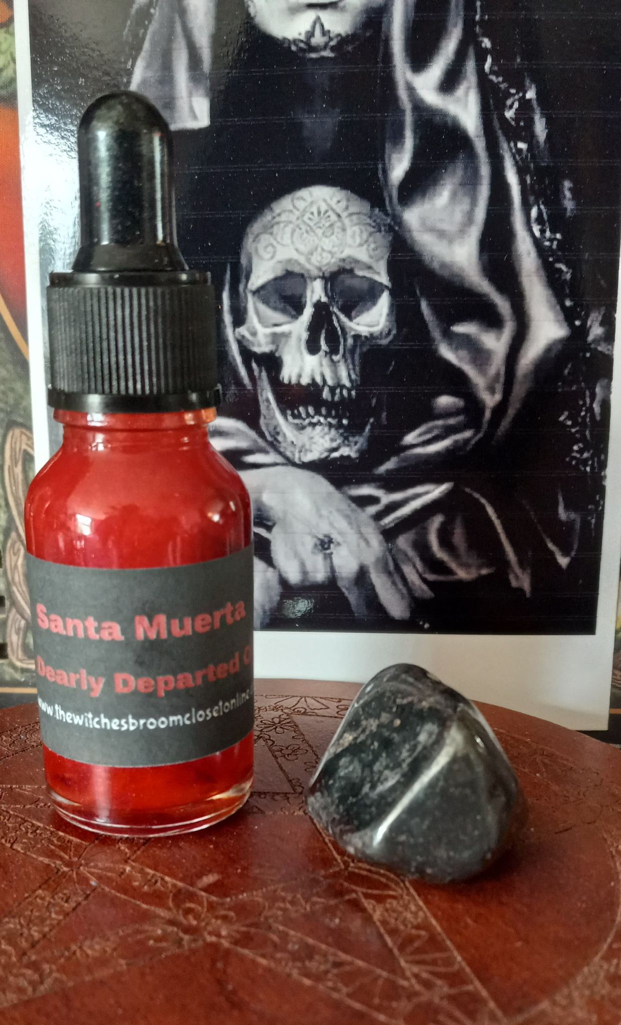 Dearly Deaparted Santa Muerta Oil - Click Image to Close